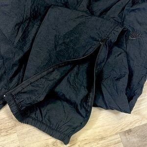 Vintage Nike Black Embroidered Logo Zippered Leg Nylon Windbreaker Track Pants S